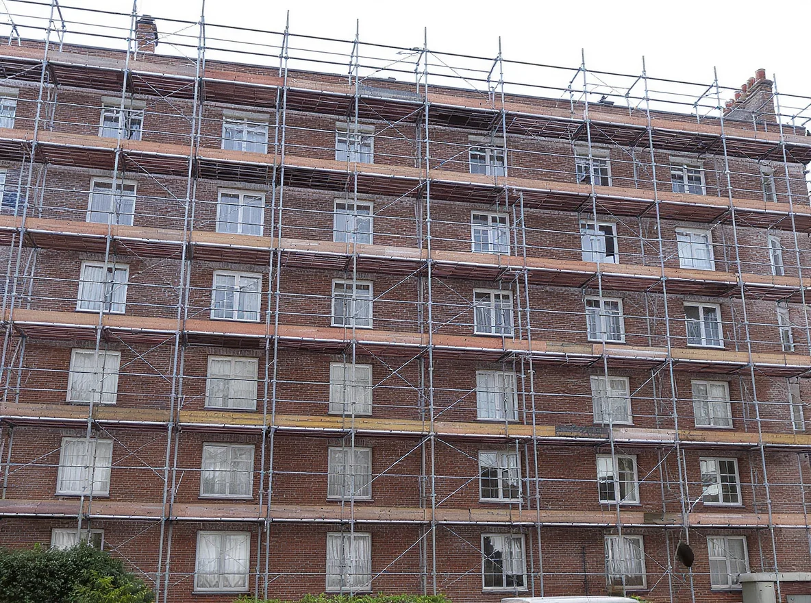 Scaffolding on the facade of a London ex-council residential block during major external works