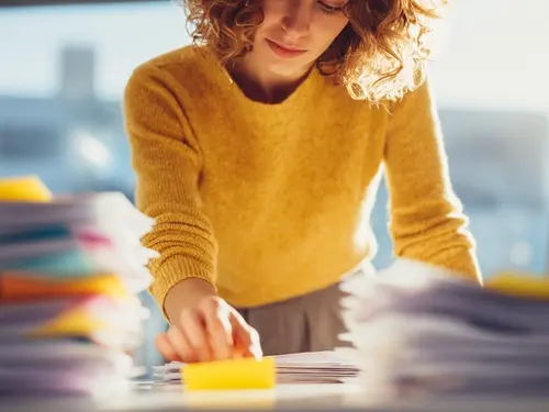 Woman sorting out paperwork